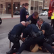 Stockton, Calif., police officers tackle and arrest a teen for jaywalking.
YouTube screenshot
